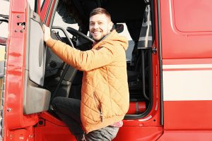 driver-smiling-red-truck