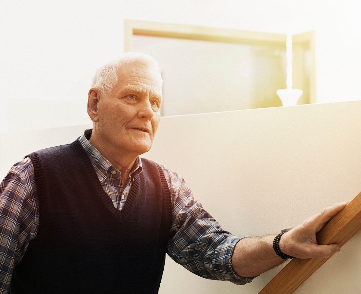 Senior man wearing a smart care watch