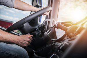 driver starting turning on ignition of a hgv in the sunlight with onboard video telematics